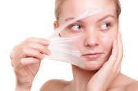 woman facial peeling